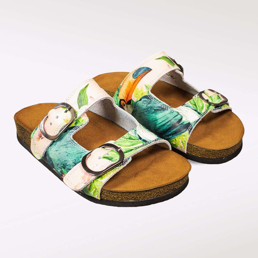 Side profile of tropical print double band open toe leather sandals