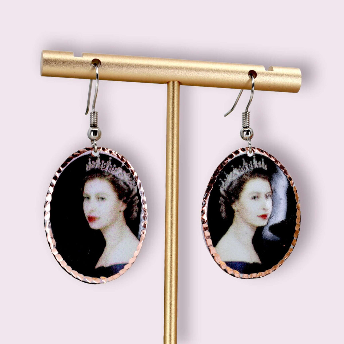 Back view of artisan Queen Elizabeth II copper oval earrings