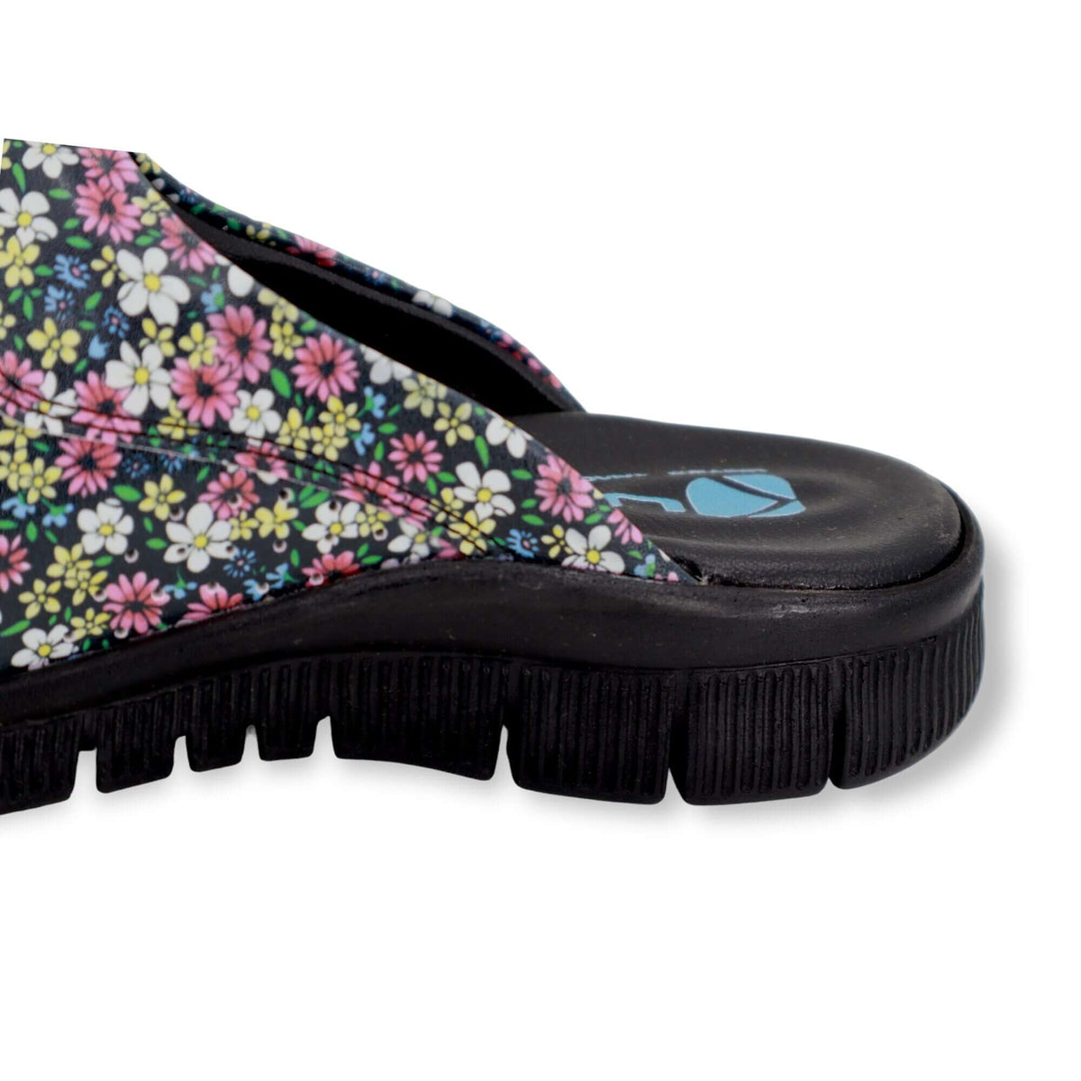 Top-down view of handmade unisex purple flower leather clogs with a Comfortflex sole