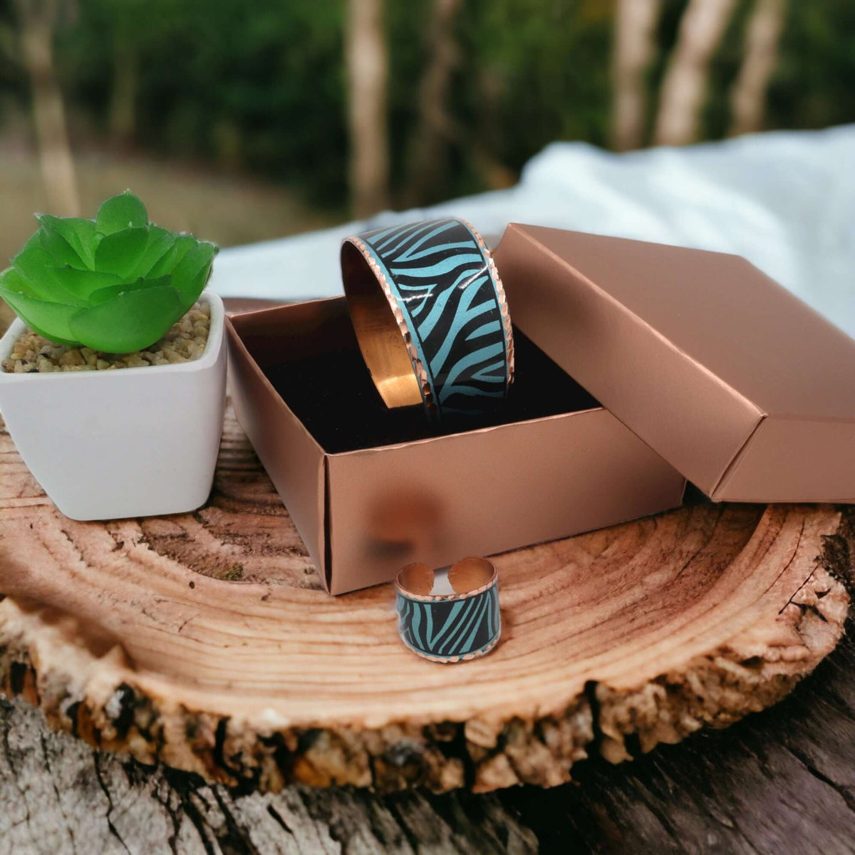 Close-up of one piece from adjustable turquoise copper ring and bracelet set