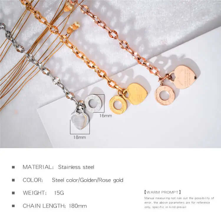 Inner side view of heart charm chain bracelet with a steel toggle clasp