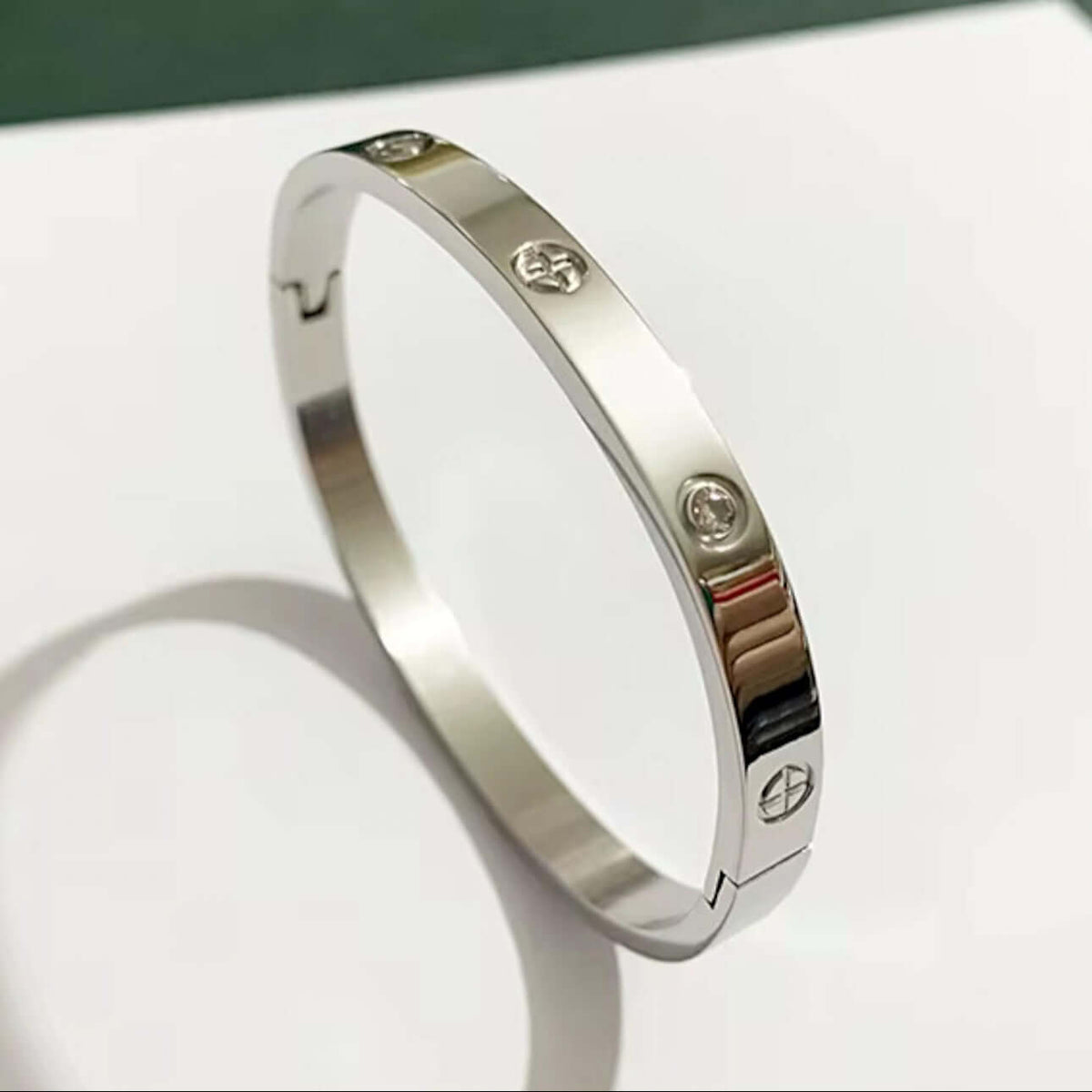 Front view of silver stainless steel cuff bracelet with zirconia stones