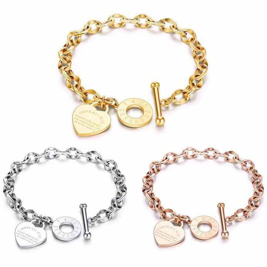 Front view of heart charm chain bracelet with a steel toggle clasp