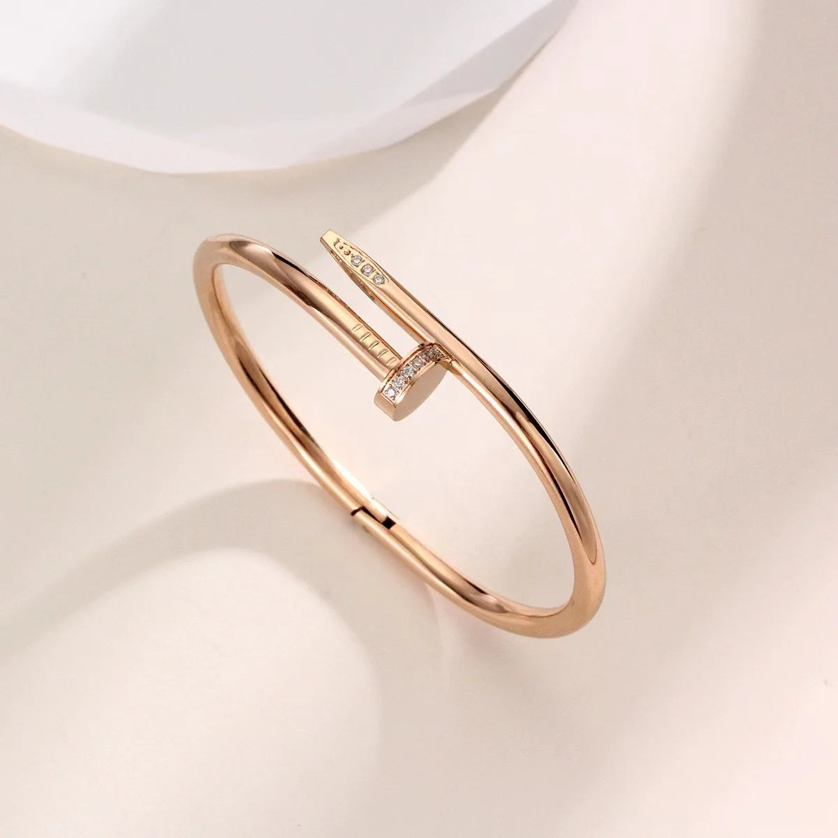 Rose gold nail style stainless steel bangle bracelet