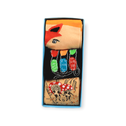 The full three-pack socks box set with mushroom fox and three cats designs laid flat