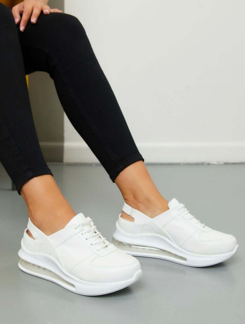 Sole and tread detail of handmade white leather sneaker clogs with a Supermax sole
