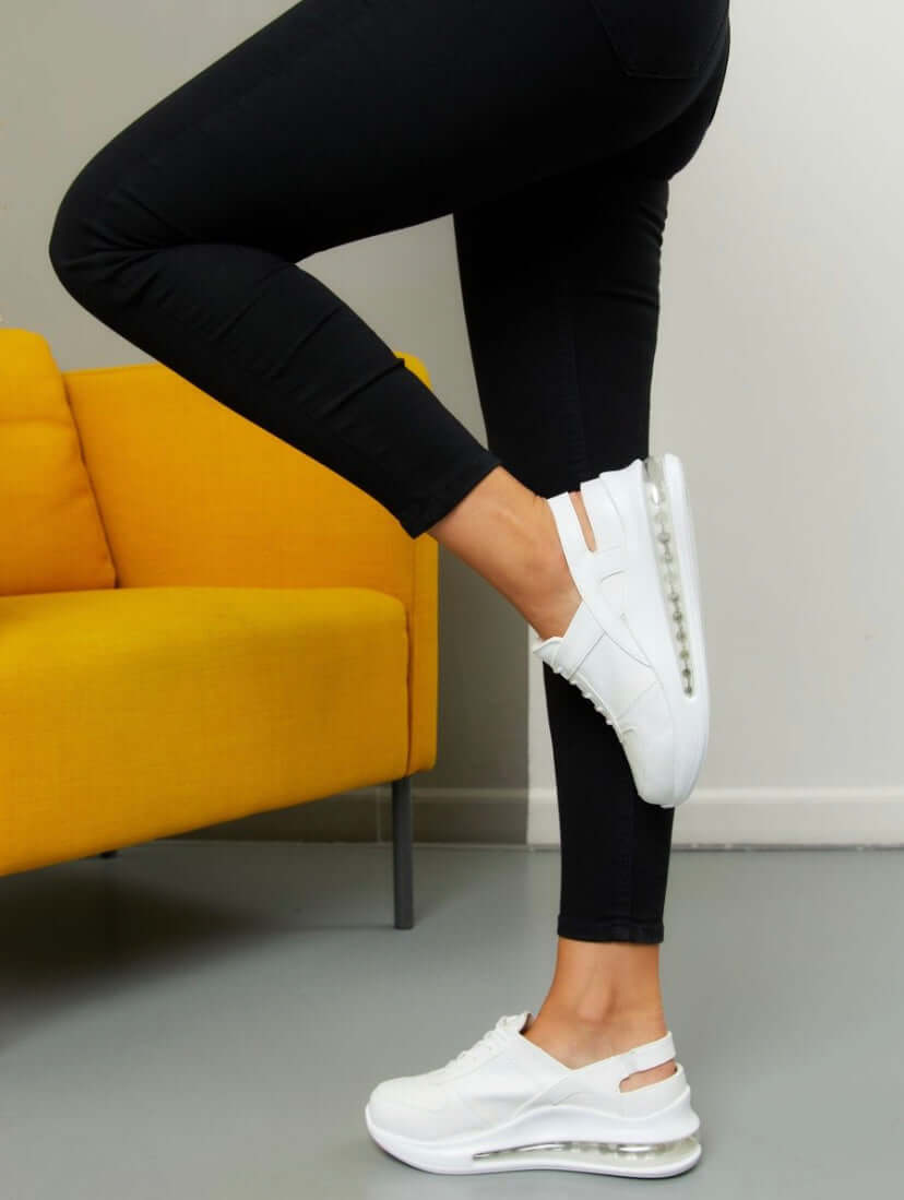 Footbed detail of handmade white leather sneaker clogs with a Supermax sole