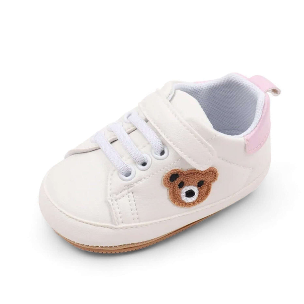 Front view of pink teddy bear baby sneakers with a soft sole