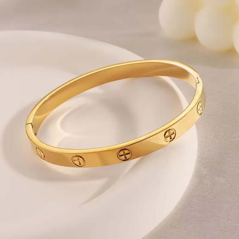 Close-up of the surface finish on gold plated stainless steel couple bangle