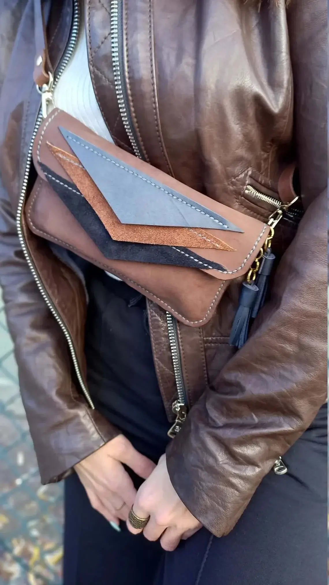 Triangle brown leather belt bum bag worn at the waist