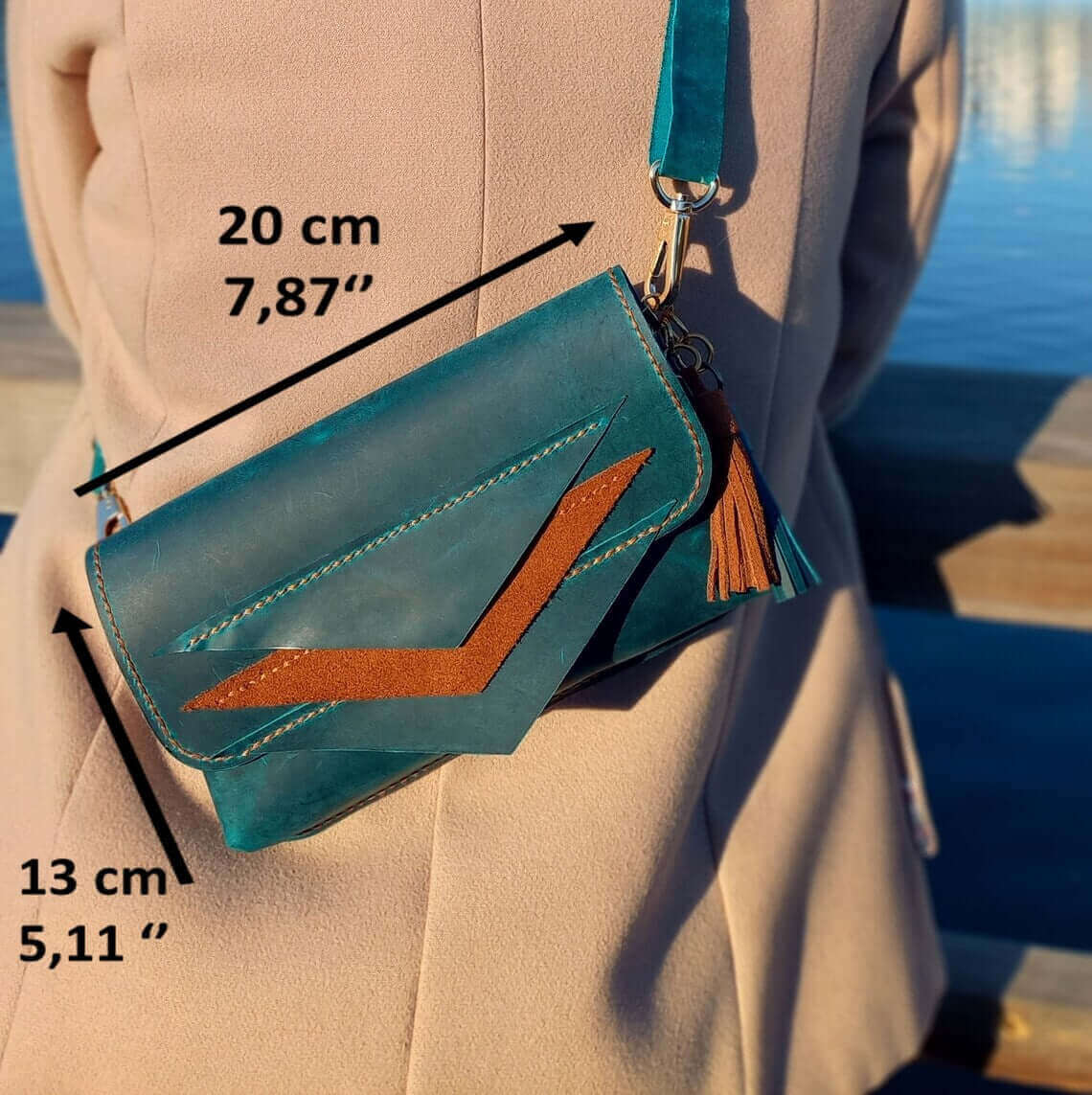 Strap and fastening detail on artisan blue leather waist bum bag in style 01