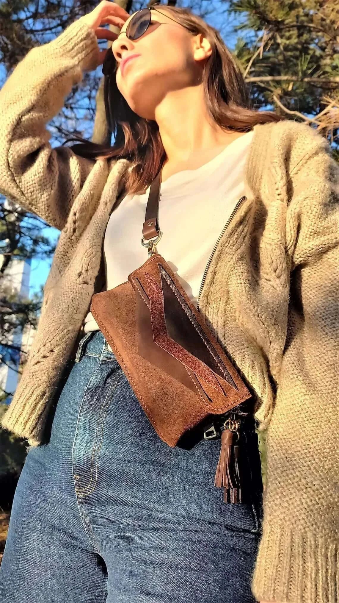 Close-up of the stitching on triangle brown leather belt bum bag in style 01