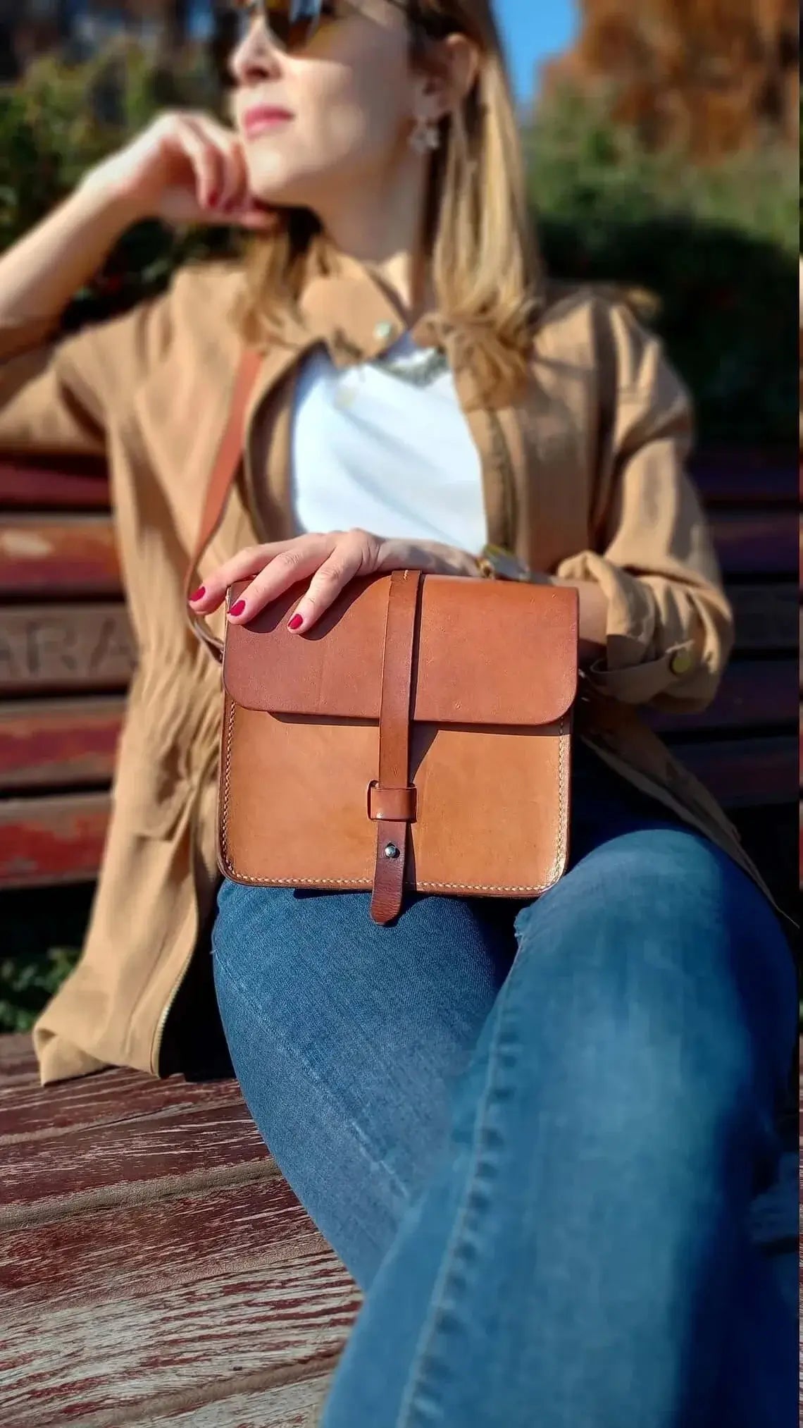Top-down view of genuine tan leather belt bum bag