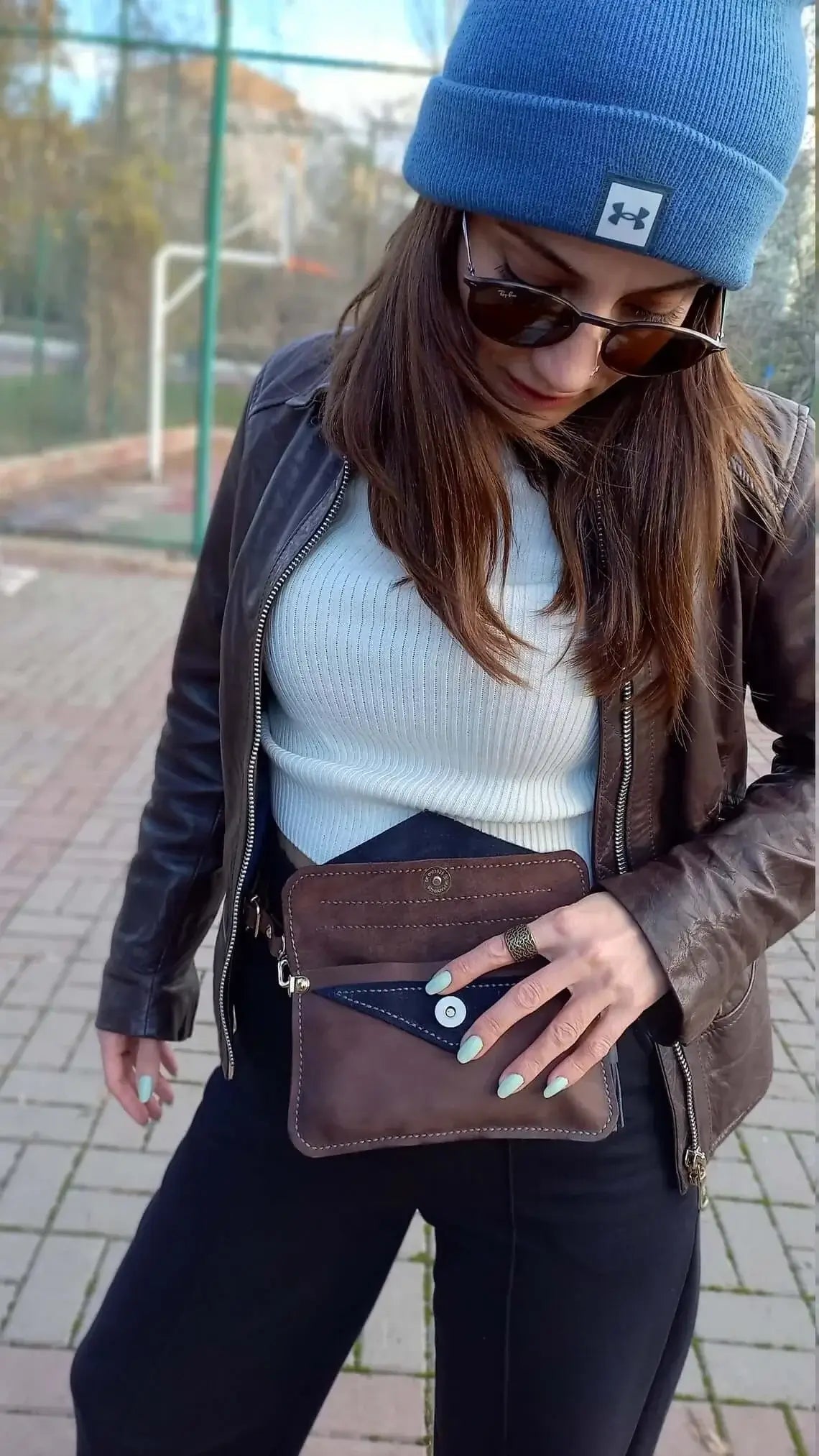 Back view of triangle brown leather belt bum bag
