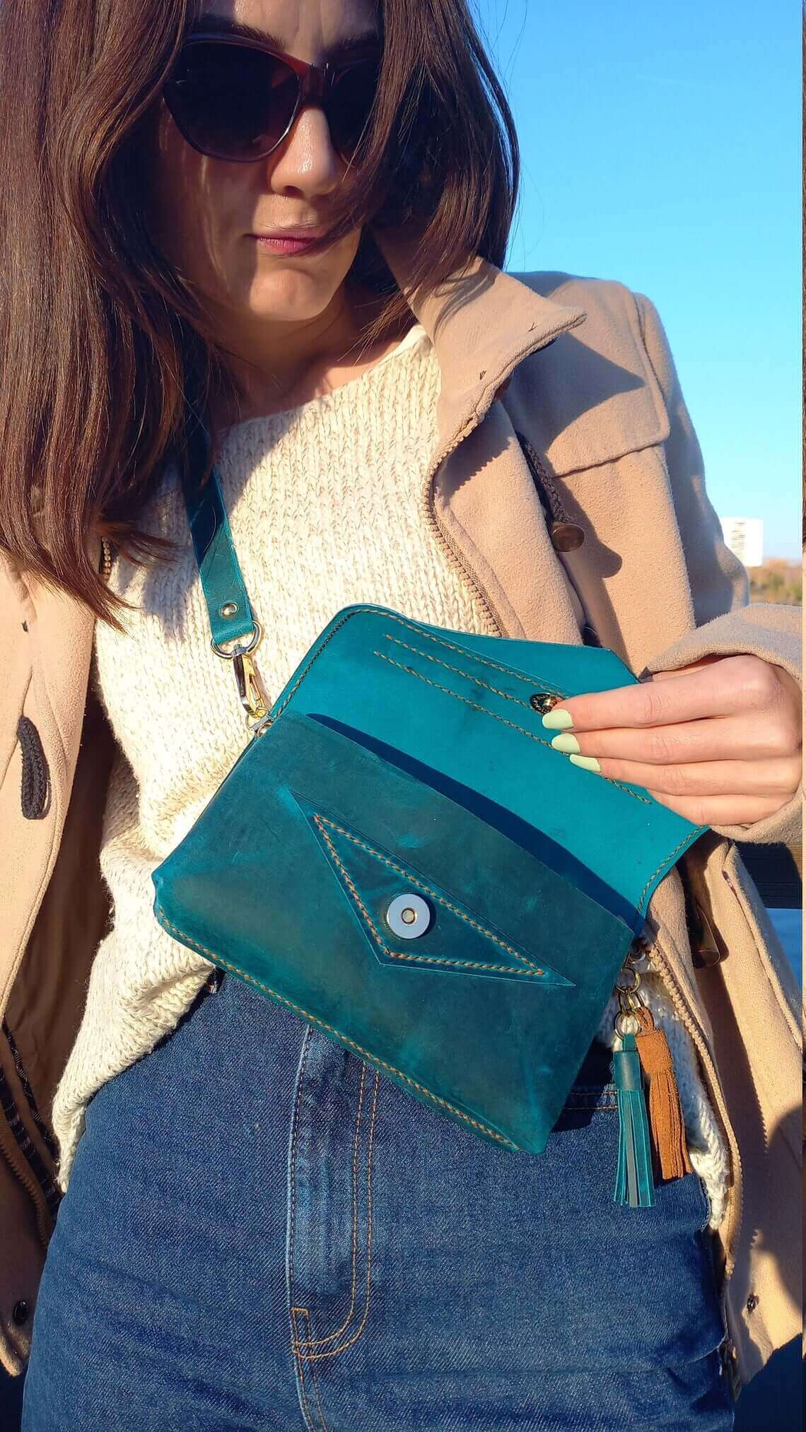 Close-up of the leather grain on artisan blue leather waist bum bag in style 01