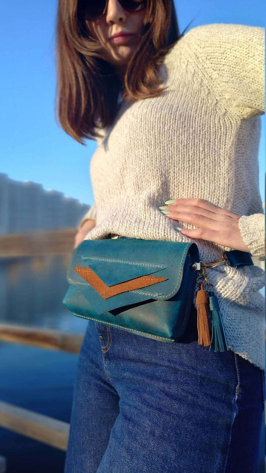 Side profile of artisan blue leather waist bum bag in style 01