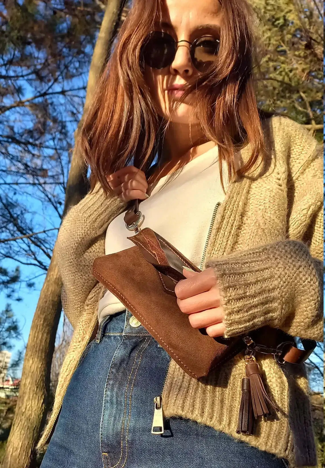 Close-up of the leather grain on triangle brown leather belt bum bag in style 01