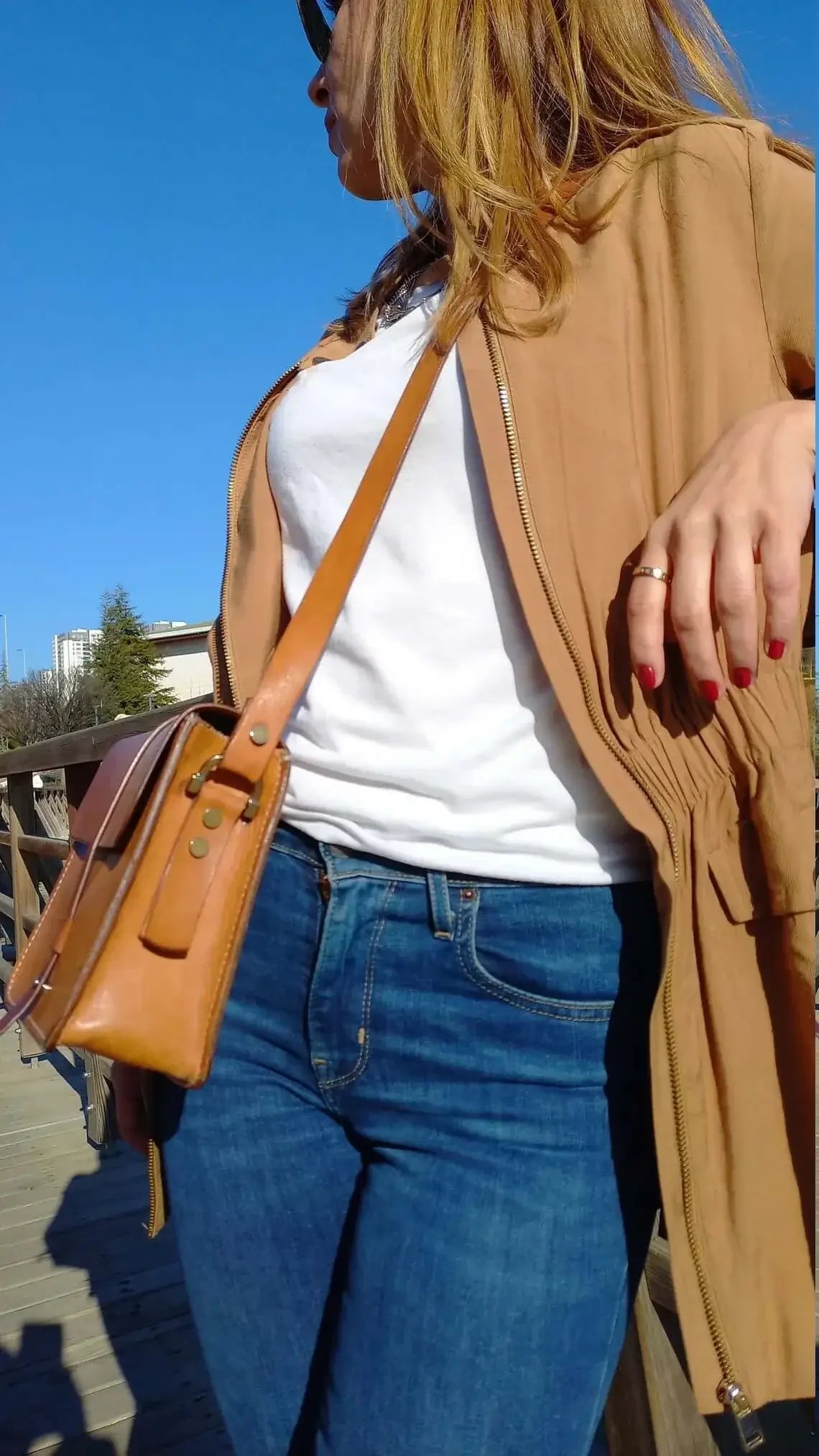 Genuine tan leather belt bum bag worn at the waist