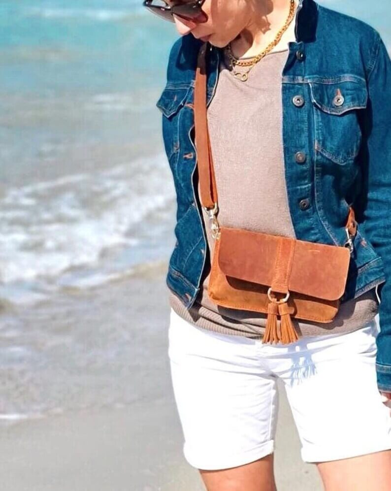 Front view of handcrafted artisan tan leather crossbody bag