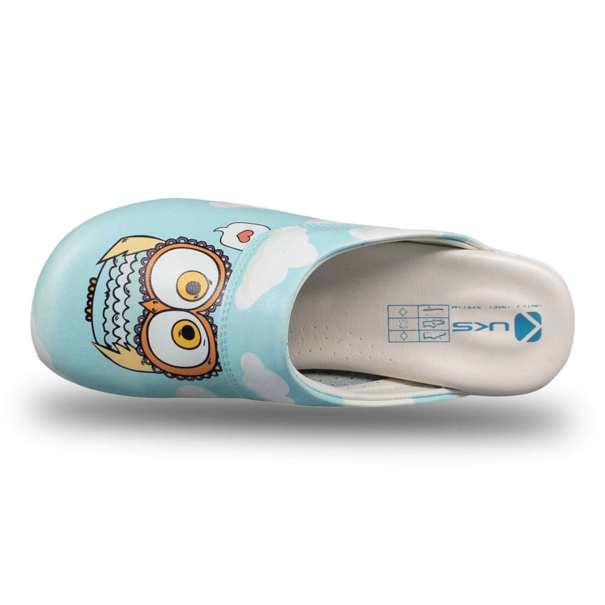 Footbed detail of handmade blue owl design leather clog slippers with an Air Clogx sole