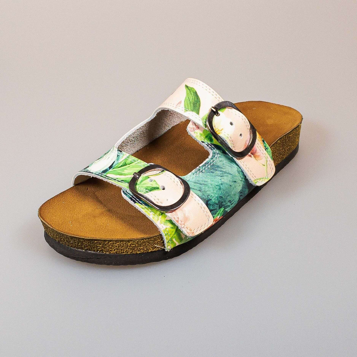 Tropical print double band open toe leather sandals worn on the foot