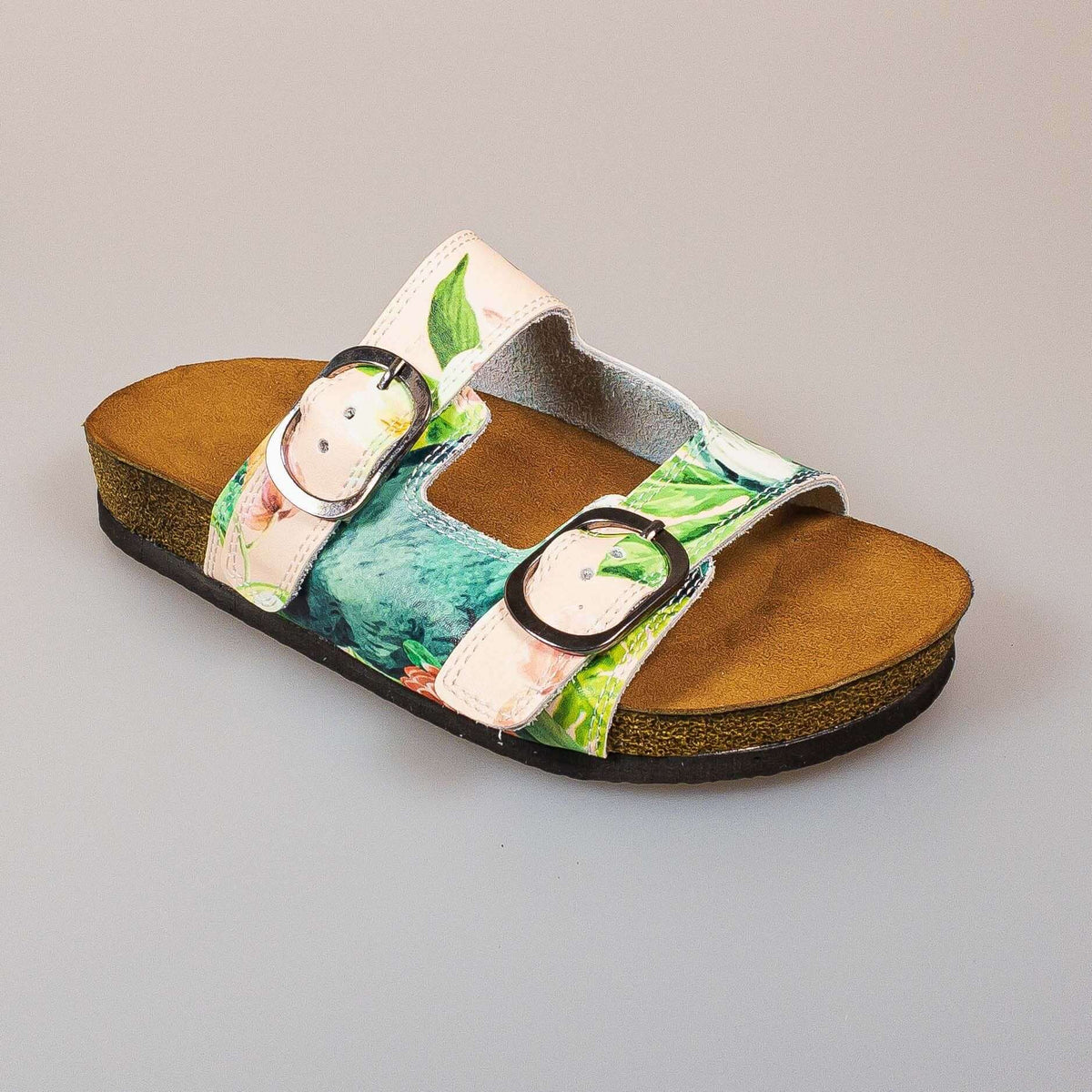 Sole and tread detail of tropical print double band open toe leather sandals