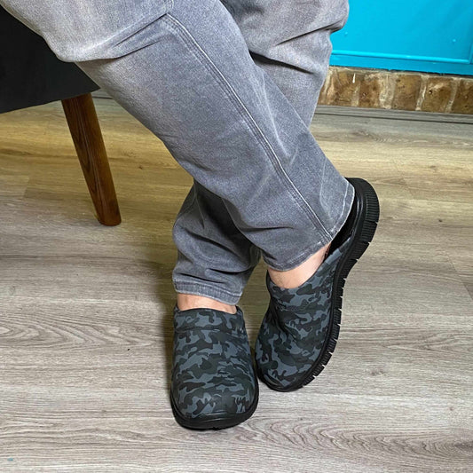 Front view of camouflage print leather clogs with an ergonomic Comfortflex sole