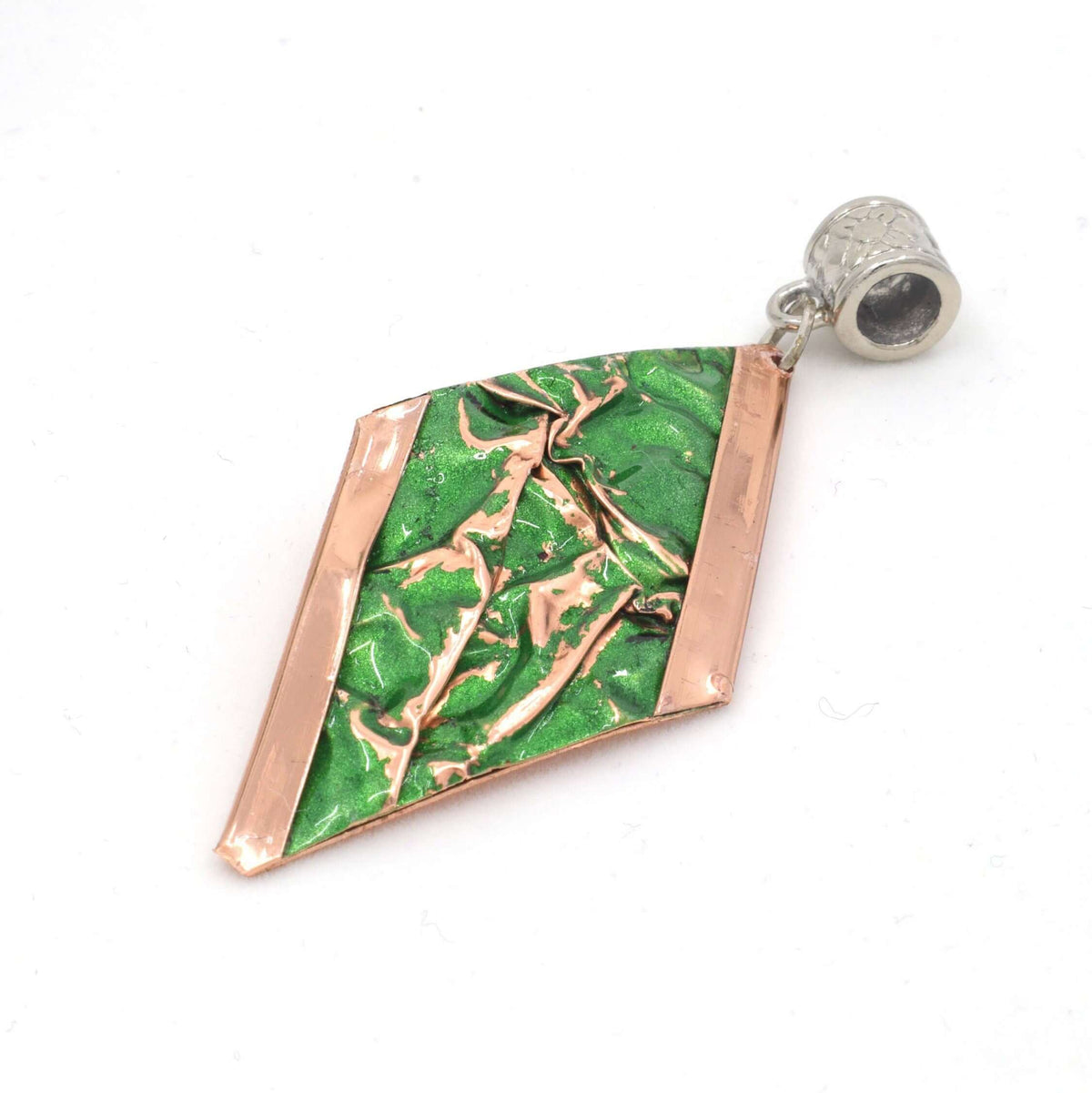 Angled view of complete green wrinkled copper jewellery set