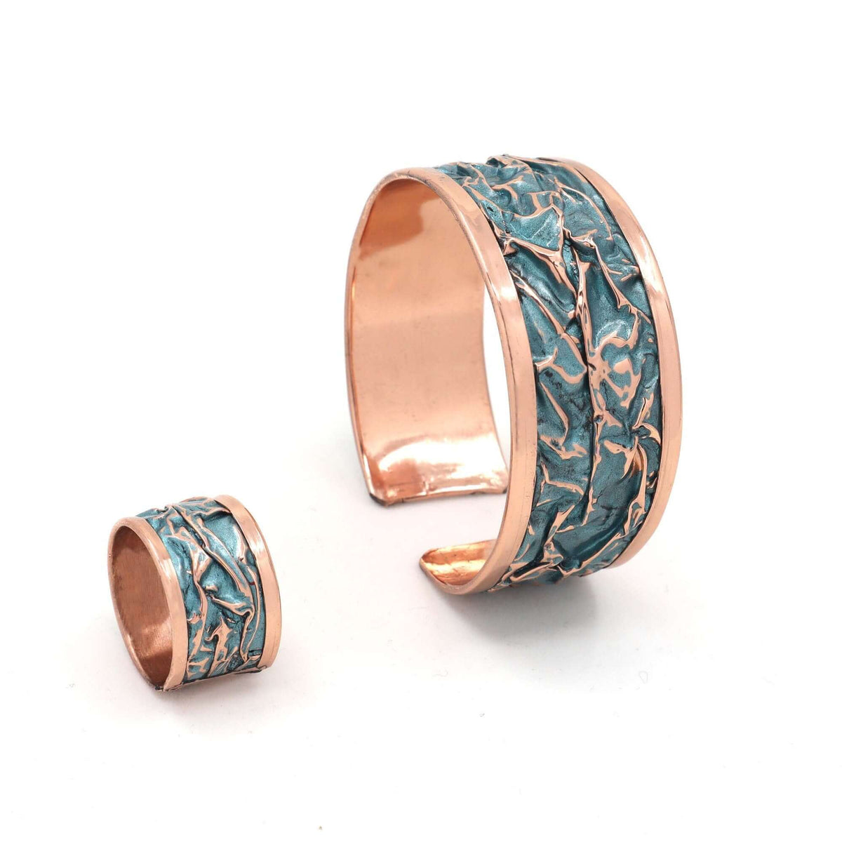 Side angle of four-piece turquoise wrinkled copper jewellery set