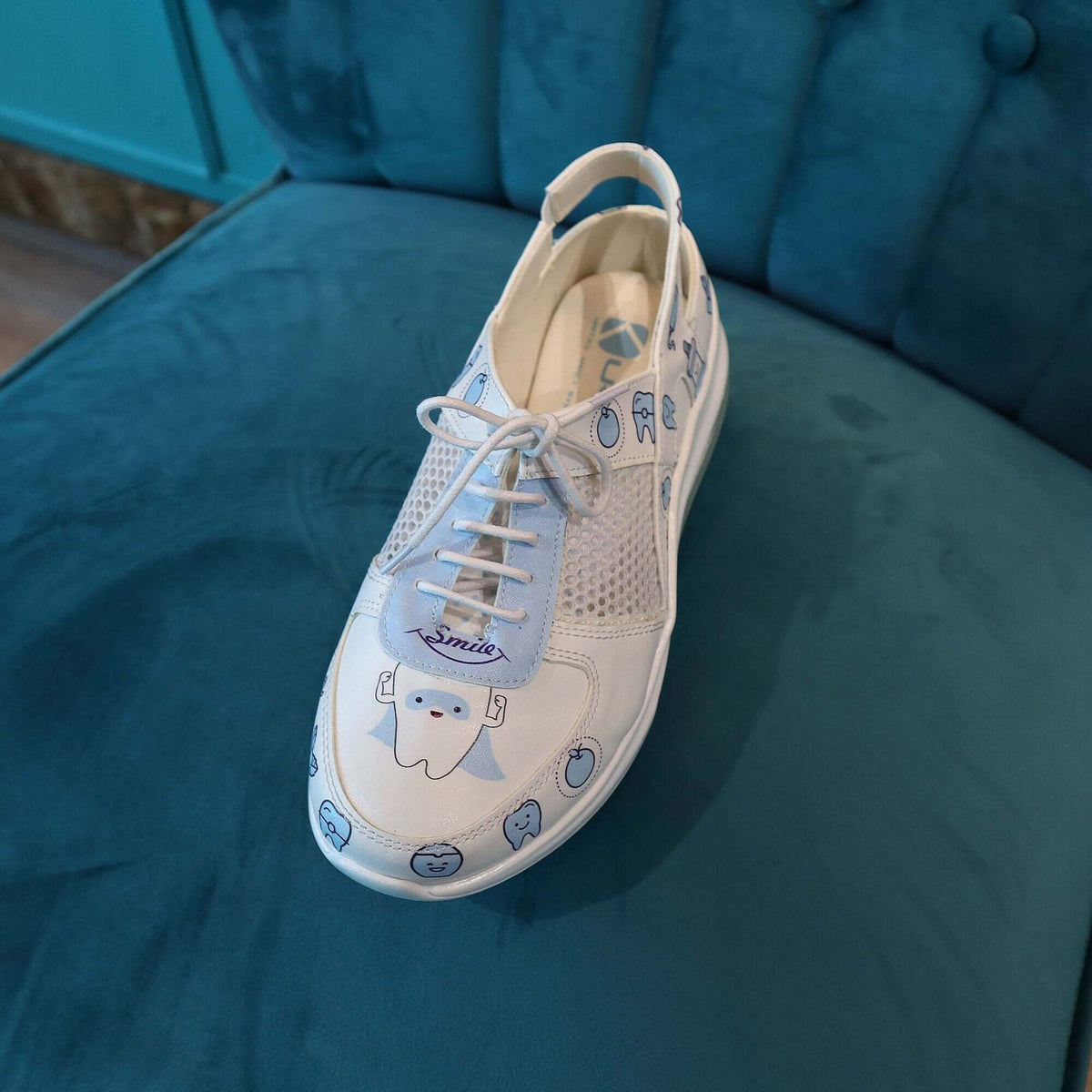 Dentist design leather nursing sneaker clogs with a Supermax sole worn on the foot