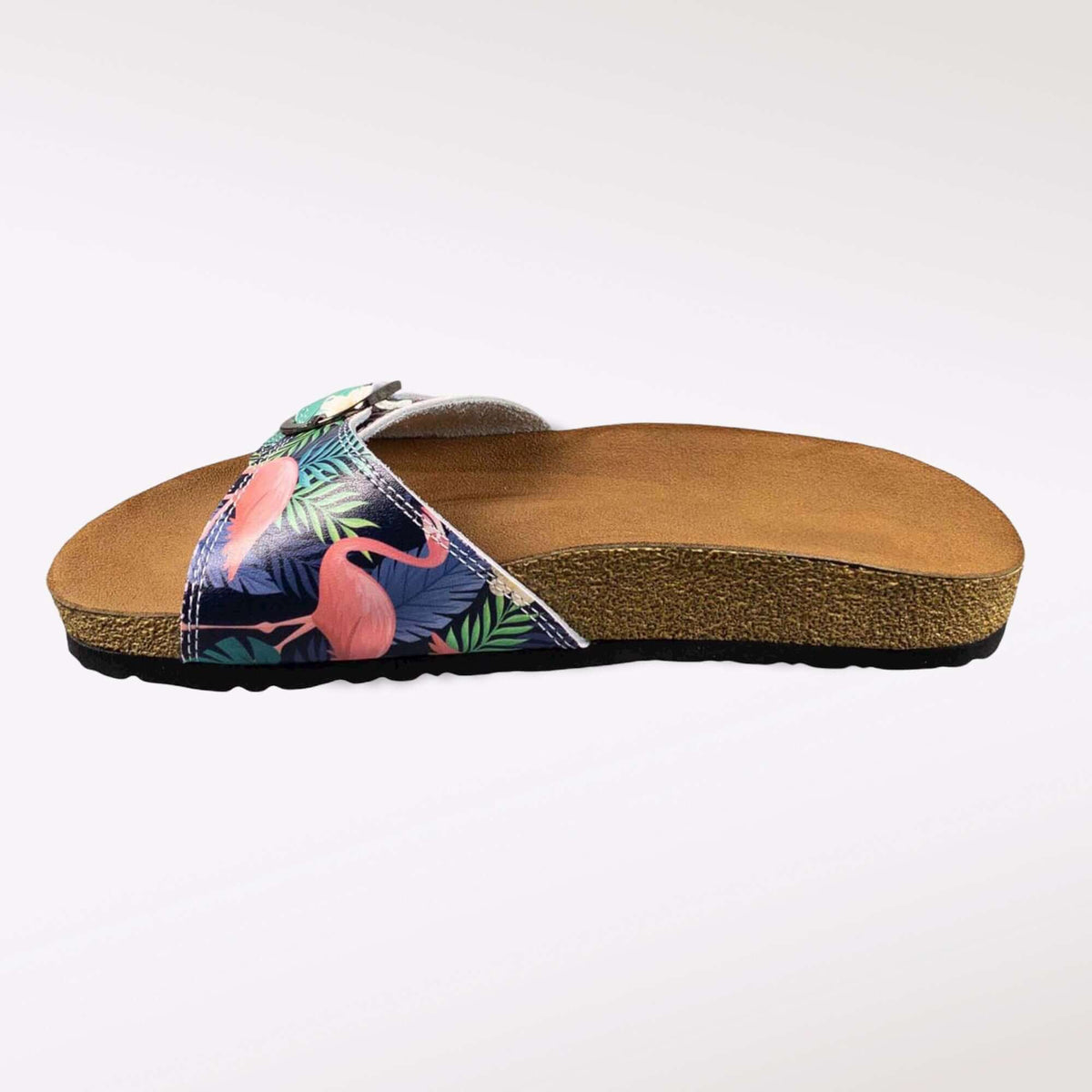 Footbed detail of artisan flamingo design open toe leather sandals