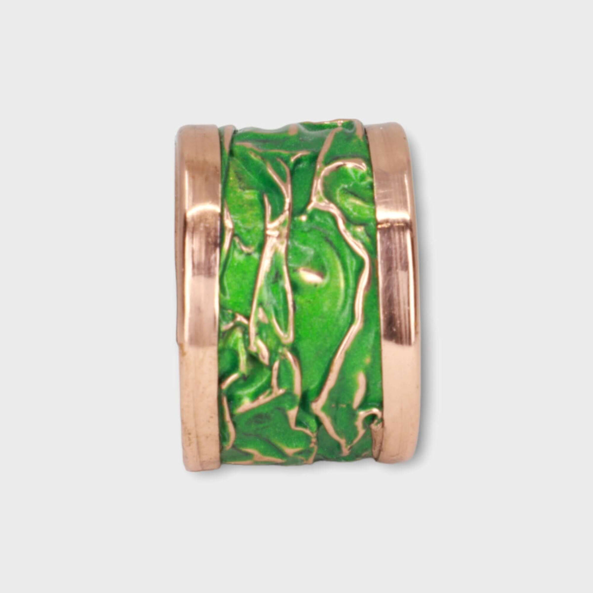 Close-up of the adjustable open band on handmade green wrinkled copper adjustable ring