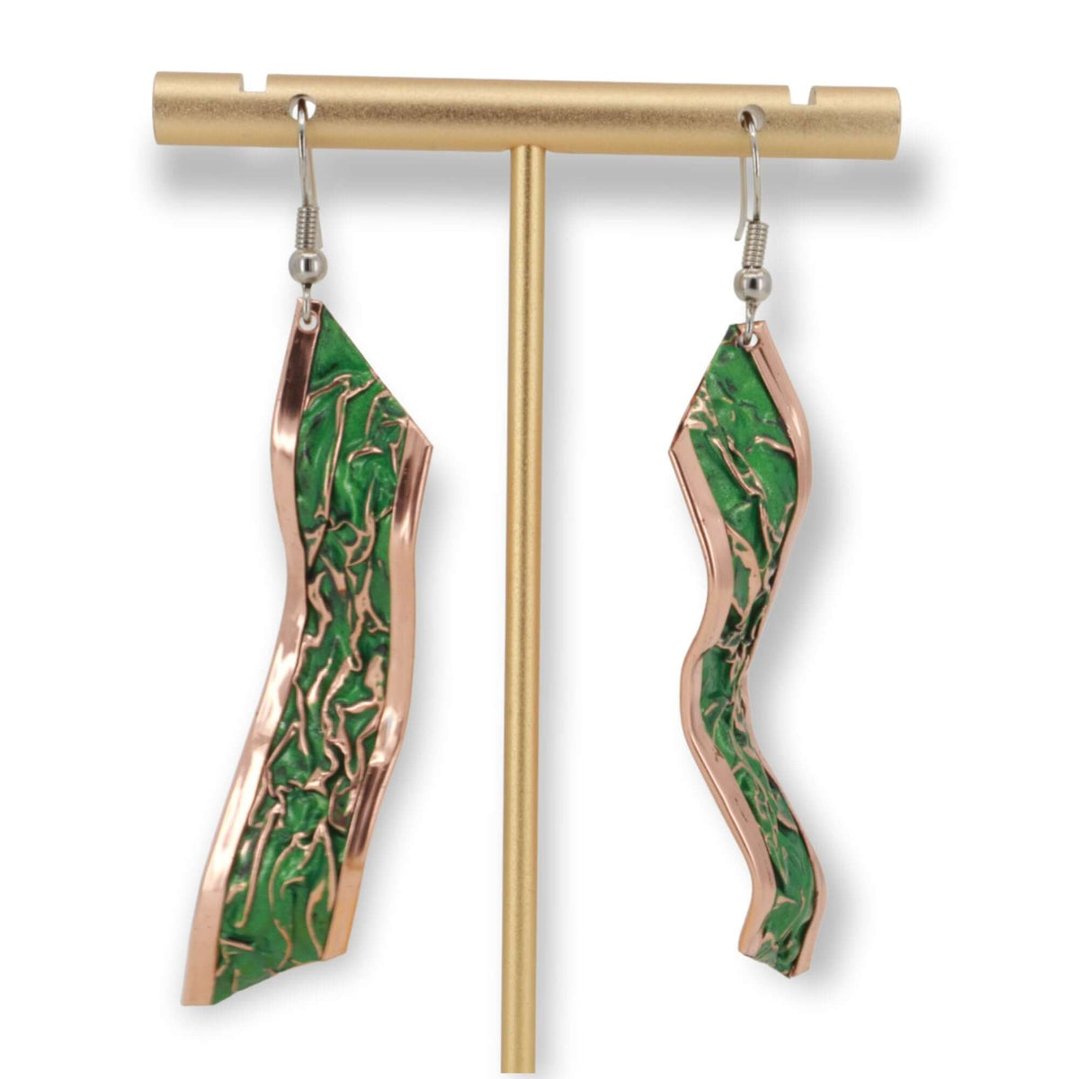 Handcrafted artisan green wrinkled copper earrings displayed on a plain background
