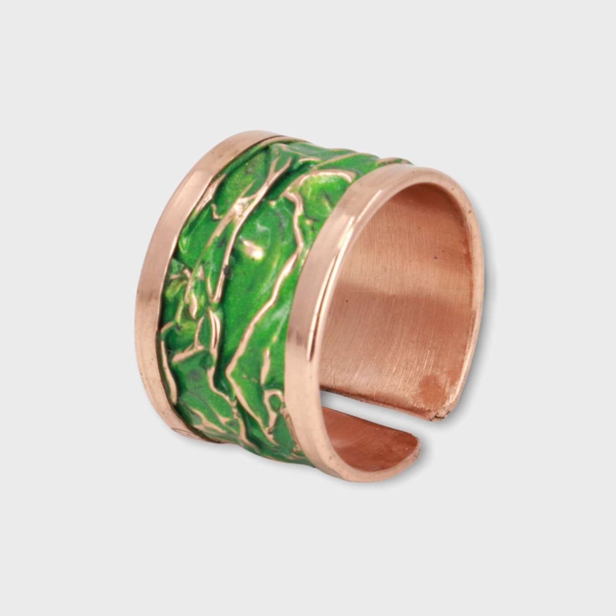 Handmade green wrinkled copper adjustable ring displayed on a plain background