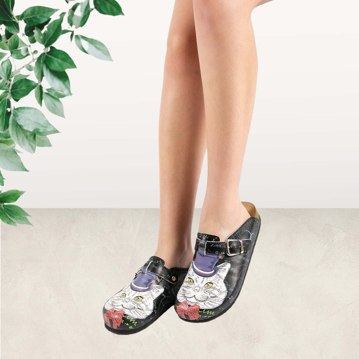 Cork sole and tread detail on the closed toe cat print clogs