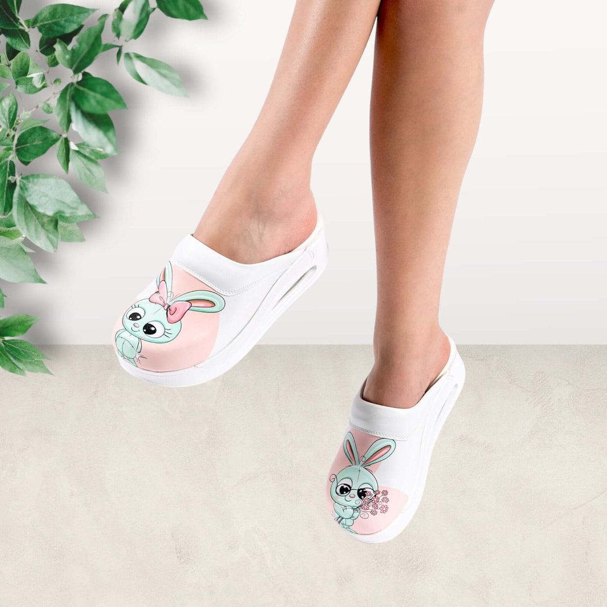 Front view of handmade bunny design leather clog slippers with an Air Clogx sole
