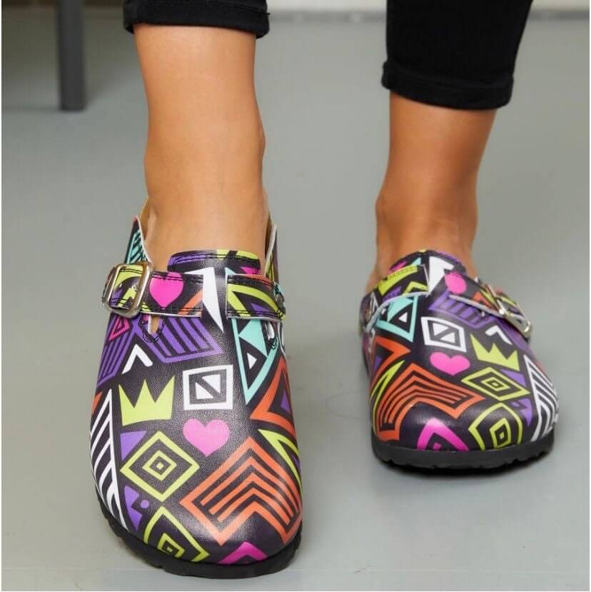Colourful leather cork sole clogs worn on the foot