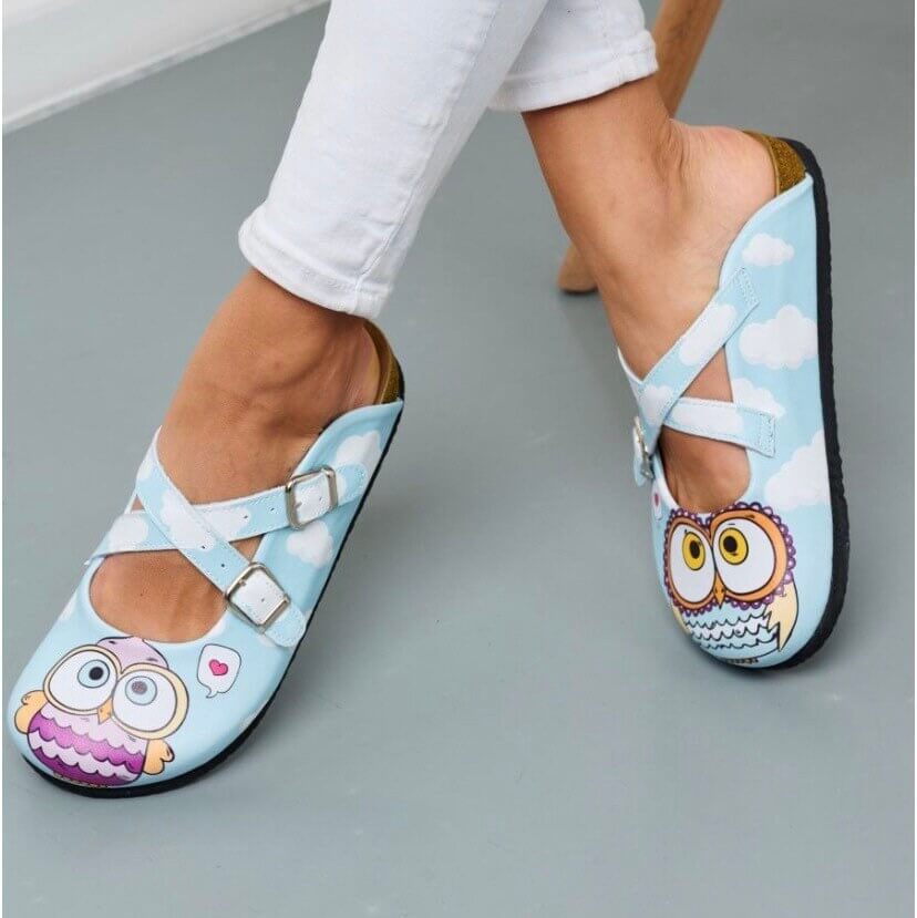 Blue owl print leather clogs with cork sole, front view
