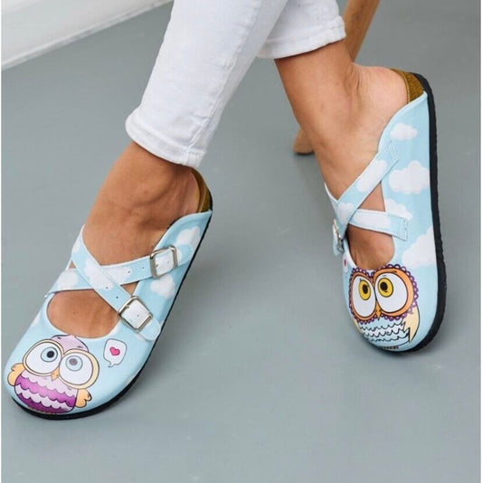 Blue owl print leather clogs with cork sole, front view
