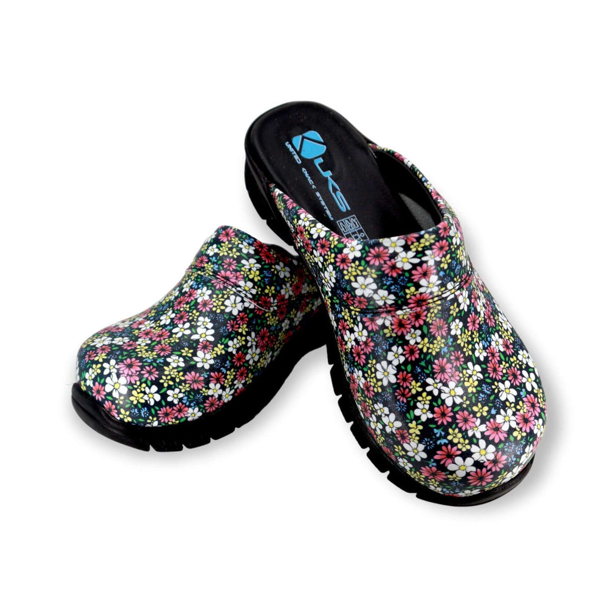 Footbed detail of handmade unisex purple flower leather clogs with a Comfortflex sole