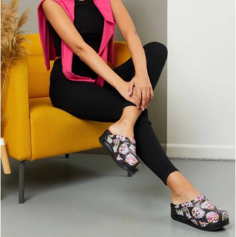Footbed detail of handmade skull and flower leather clogs with an Air Clogx sole