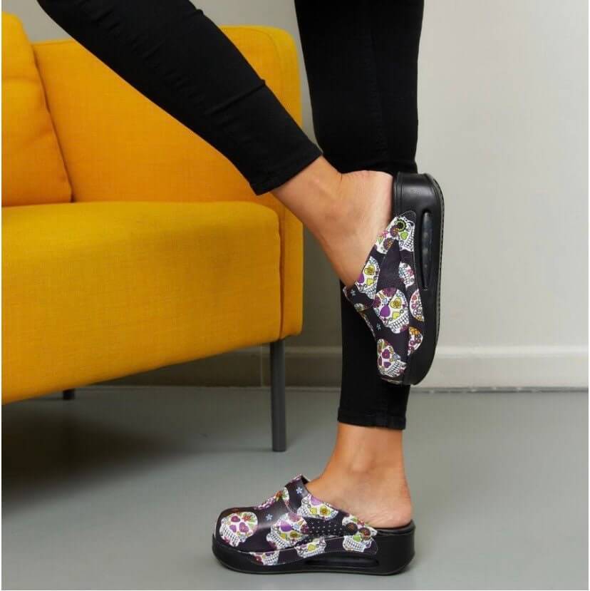Sole and tread detail of handmade skull and flower leather clogs with an Air Clogx sole