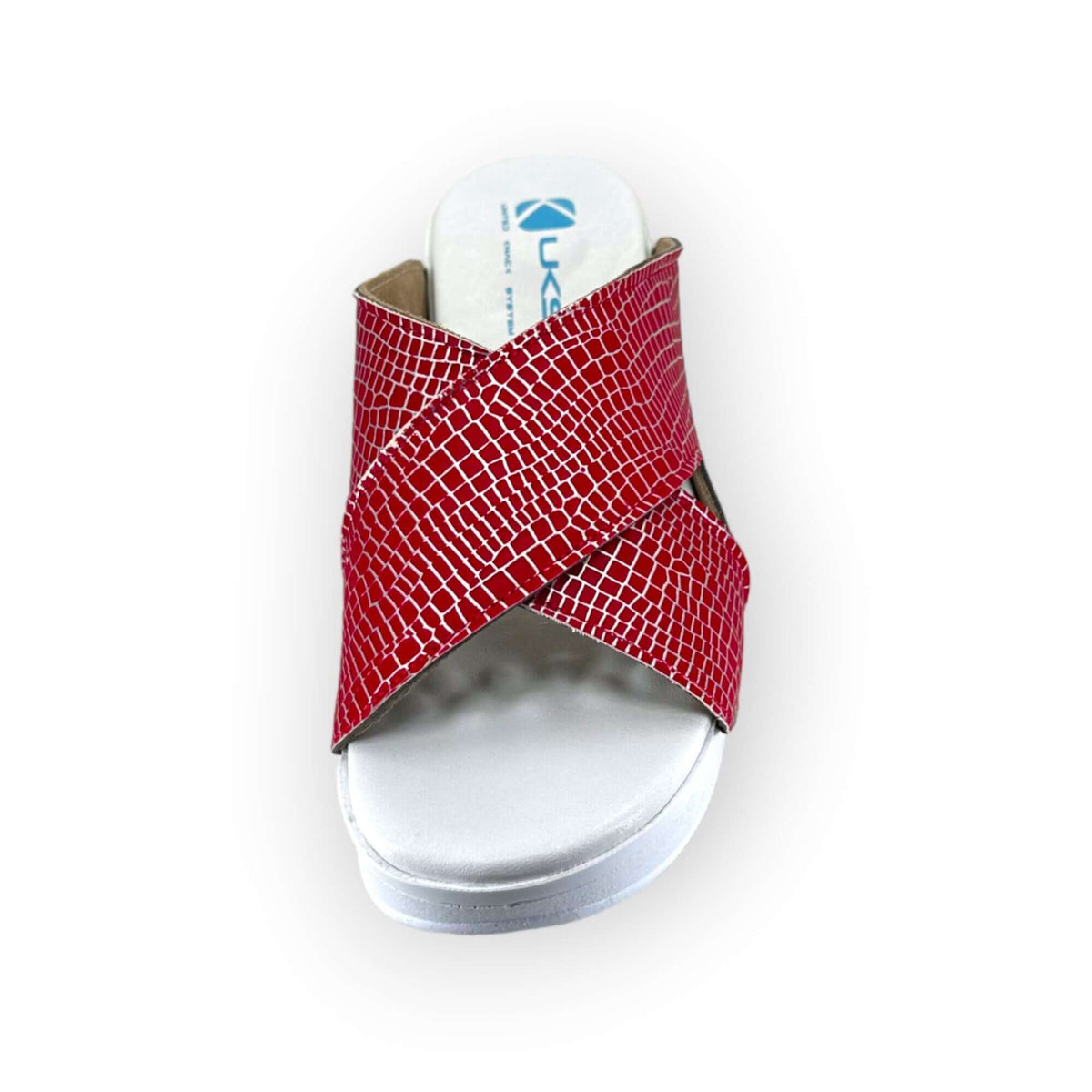 Sole and tread detail of red and silver cross band leather clogs with an Air Clogx sole