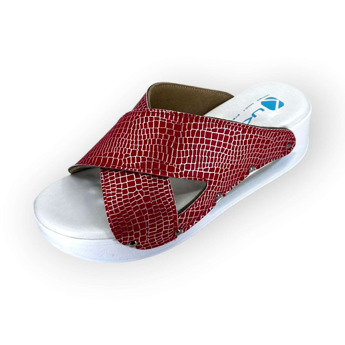 Top-down view of red and silver cross band leather clogs with an Air Clogx sole
