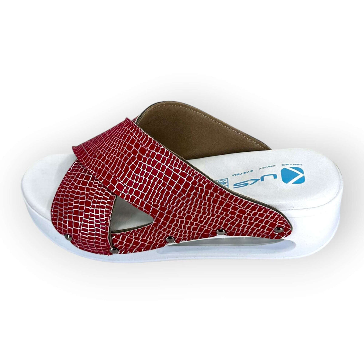 A pair of red and silver cross band leather clogs with an Air Clogx sole placed side by side