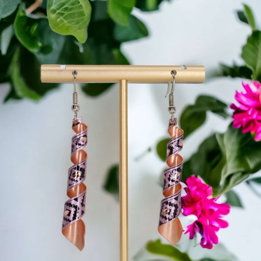 Front view of handcrafted artisan pink auger copper earrings