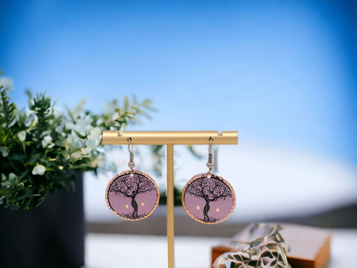 Handcrafted lavender tree copper circle earrings worn on the ear