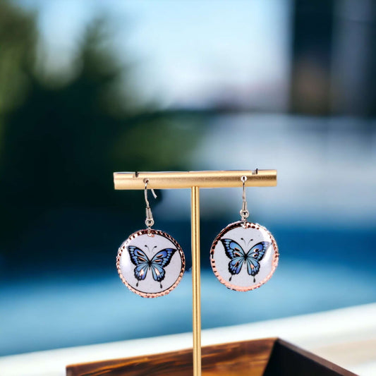 Close-up of the copper texture on handcrafted butterfly copper circle earrings