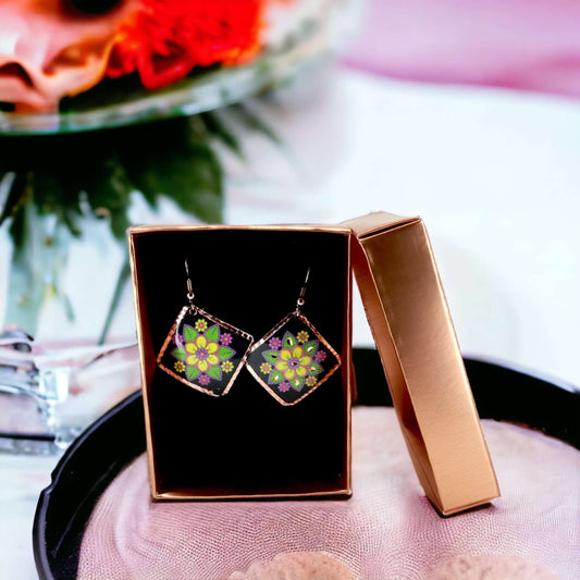 Close-up of the copper texture on handcrafted square yellow flower copper earrings