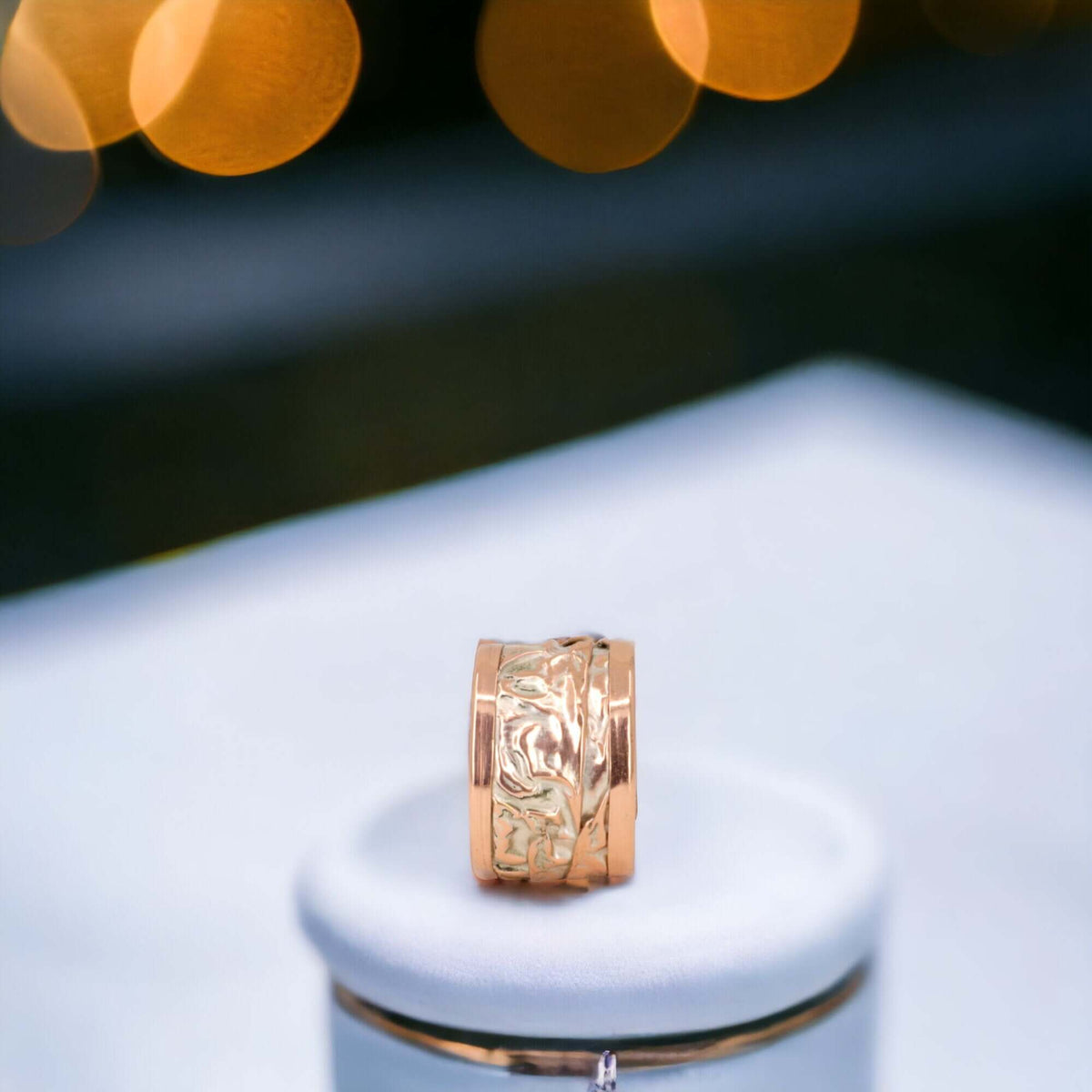 Artisan silver wrinkled copper adjustable ring worn on the finger